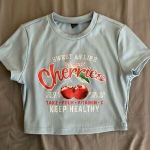 Cropped light blue cheery shirt! Super cute, worn once